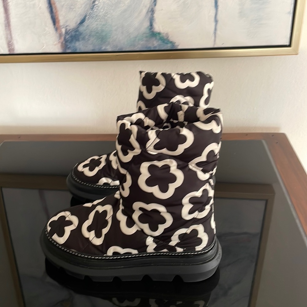 These are cool Tory Burch boots, all weather!